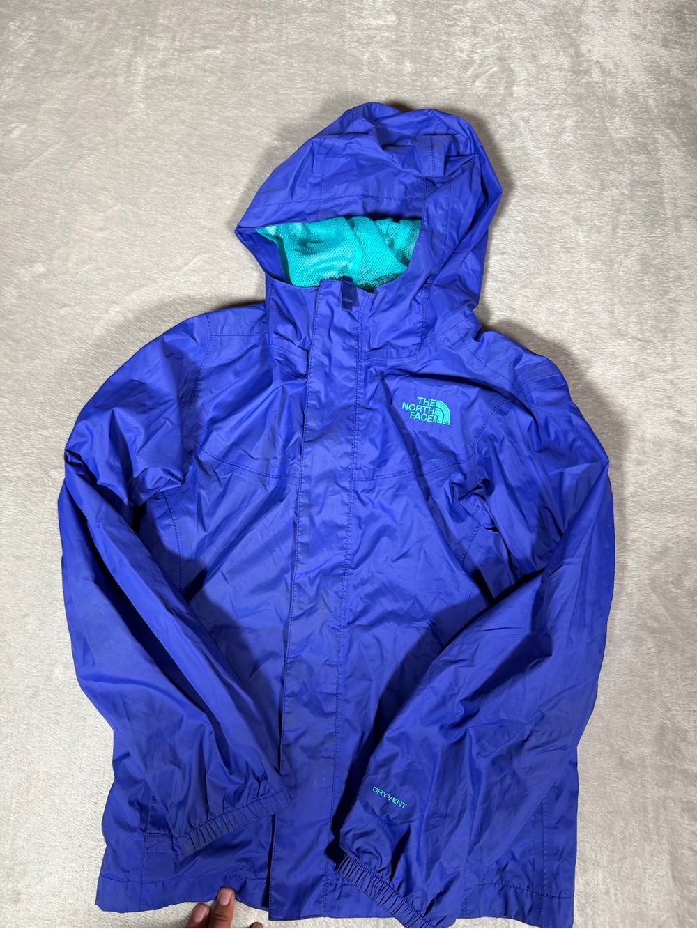 The North Face Kids Blue Raincoat with Teal Lining